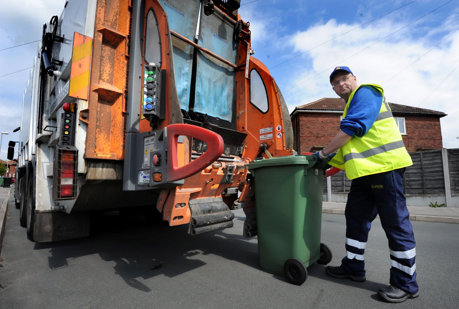 bin men collecting green bin