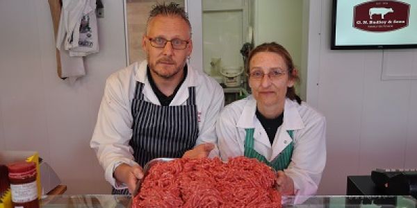 Lee Evans, butchery manager and Kay Badley, operations director, welcome new school menu