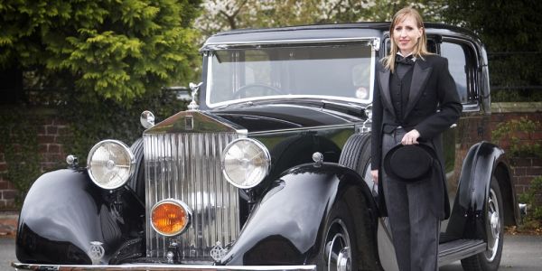 Leanne Garvey and a vehicle at Aubrey Kirkham Funeral Directors