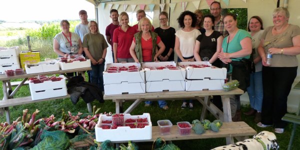 The FBC Manby Bowdler team with some of the fruit they harvested to donate to good causes