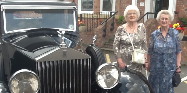 Friends win raffle prize for a vintage car ride and afternoon tea
