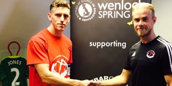 Billy Jones, left, with Andy Smith of the Crossbar Foundation