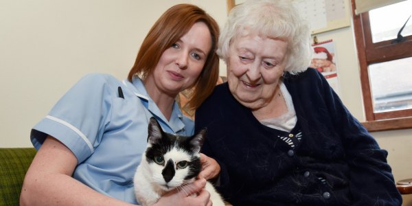Innage Grange's Becky Whitehouse with resident Marjorie Hawley and her cat Stacy 2
