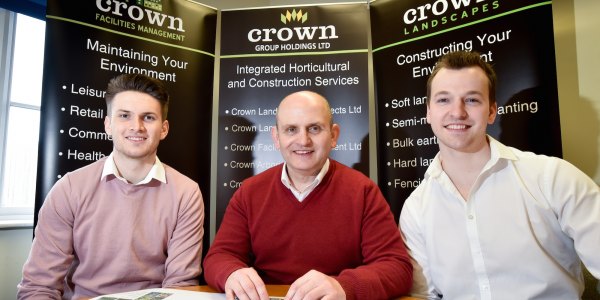 Crown Group's Gareth Emberton (centre) with apprentice Dominik Colbron (left) and former apprentice Richard Moss (right)