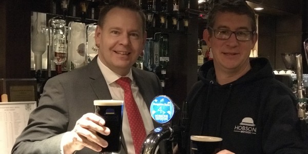 Wayne Jenson from Buckatree Hall Hotel and Reuben Crouch of Hobsons Brewery celebrate newly available Shropshire Stout