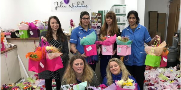 Care staff collecting the bouquets