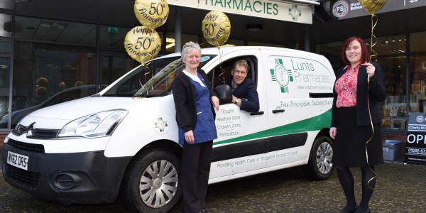 Martin Lunt with Mary Lewis and Lorraine Anderson celebrating the Lunts Pharmacy 50th year