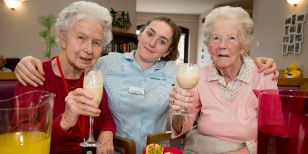 Mary Evans, Care assistant Nancy Broad and Enid Becker celebrate the win by Briarfields