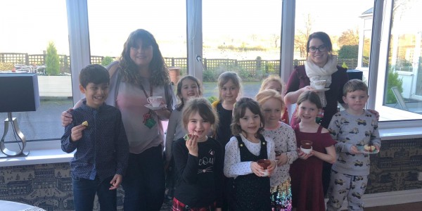 Teachers Anna Hopwood (left) and Hannah Fox with students from the Wilfred Owen School at the Wroxeter Hotel.