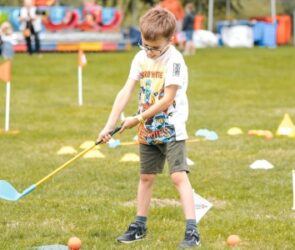 Boy playing golf in the Quarry