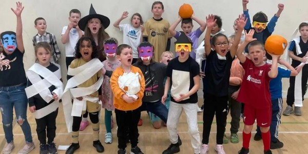 Children having fun at a Crossbar Halloween holiday club