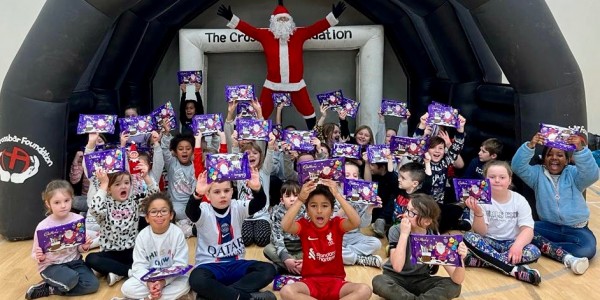 Children enjoying themselves at a Crossbar Christmas holiday club.